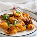 Sausage Tortellini Bake with spinach and Boursin cheese.